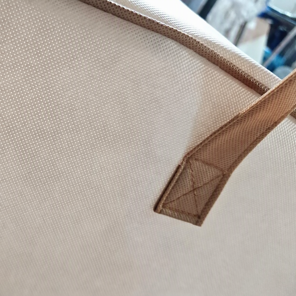 Portable rolling non-woven fabric storage - Image 3